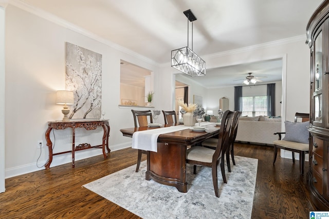 5912 Waterscape Pass, Hoover, AL 35244 - dining space with dark wood-type flooring, crown molding, and a ceiling fan