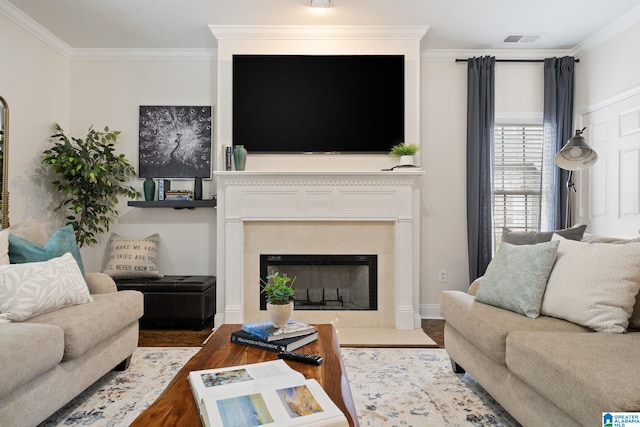5912 Waterscape Pass, Hoover, AL 35244 - living area featuring crown molding, wood finished floors, and a fireplace with flush hearth