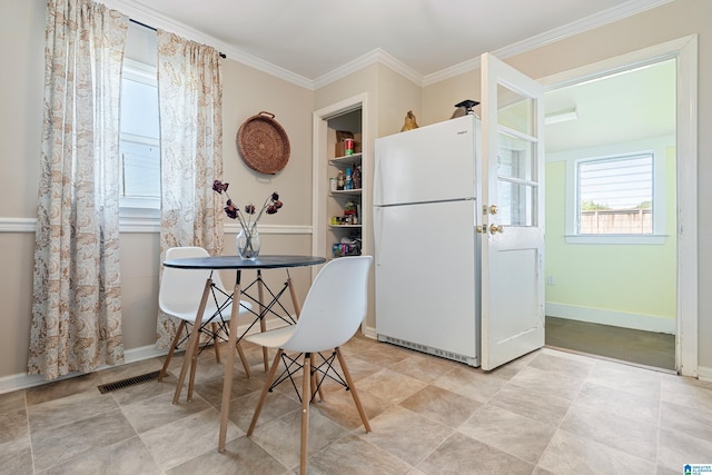 104 Phillips Cir, Columbiana, AL 35051 - dining area featuring ornamental molding and baseboards