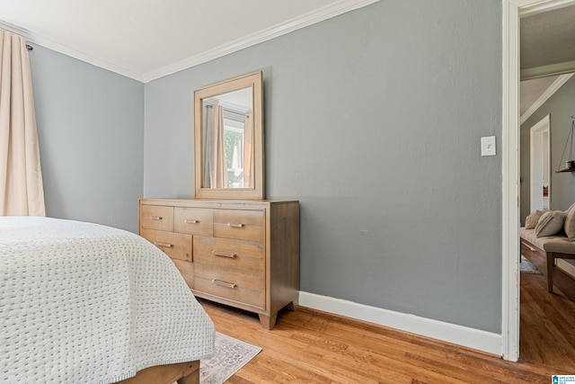 104 Phillips Cir, Columbiana, AL 35051 - bedroom with light wood-style floors and crown molding
