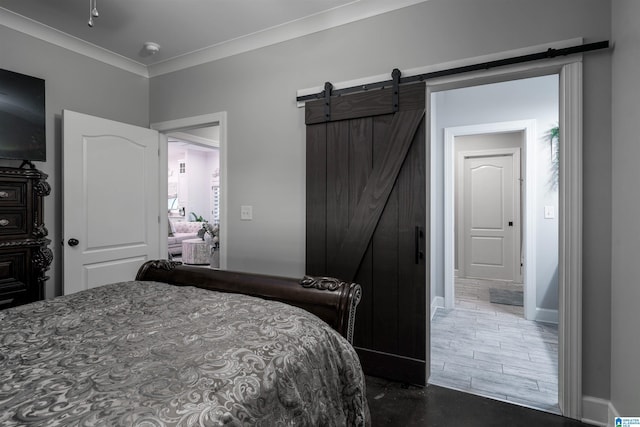 11967 Glen Ridge Blvd, Moundville, AL 35474 - bedroom featuring a barn door and ornamental molding