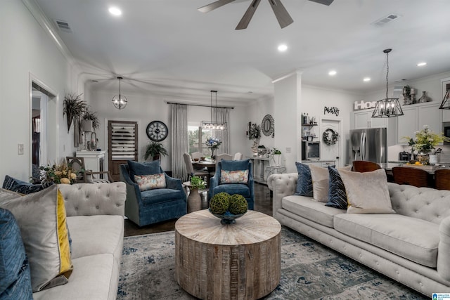 11967 Glen Ridge Blvd, Moundville, AL 35474 - living room featuring a chandelier, a ceiling fan, crown molding, recessed lighting, and wood finished floors