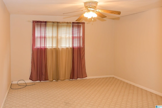 201 61st St, Fairfield, AL 35064 - empty room featuring a ceiling fan and carpet flooring