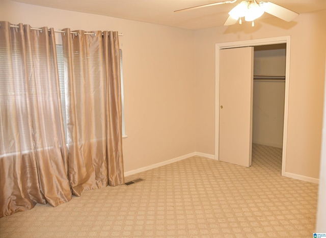 201 61st St, Fairfield, AL 35064 - unfurnished bedroom with a closet, carpet flooring, and ceiling fan