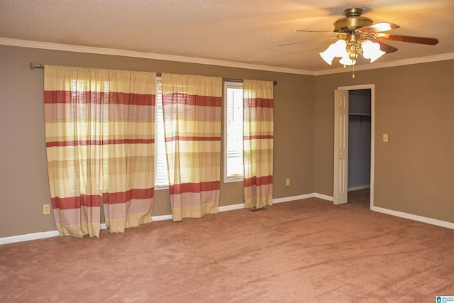 201 61st St, Fairfield, AL 35064 - unfurnished room featuring carpet flooring, a ceiling fan, ornamental molding, and a textured ceiling