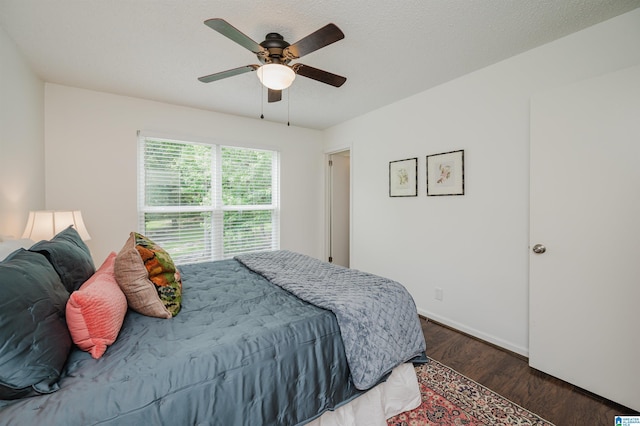 2304 Haden St, Hoover, AL 35226 - bedroom featuring dark wood-style flooring and a ceiling fan