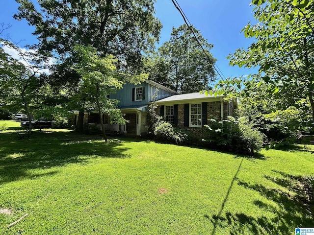 2341 Regent Ln, Hoover, AL 35226 - view of front of home featuring a front lawn and brick siding