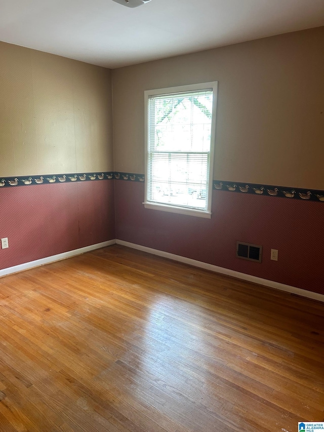 2341 Regent Ln, Hoover, AL 35226 - unfurnished room with wood finished floors and baseboards