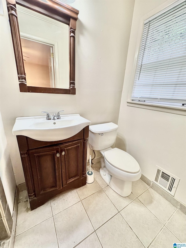 132 38th Ave NE, Center Point, AL 35215 - half bath featuring vanity and tile patterned floors