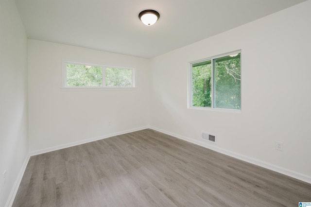 201 Sun Valley Rd, Center Point, AL 35215 - unfurnished room featuring wood finished floors and healthy amount of natural light