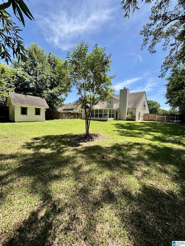 1221 Dalraida Rd, Montgomery, AL 36109 - view of yard featuring an outbuilding and a sunroom