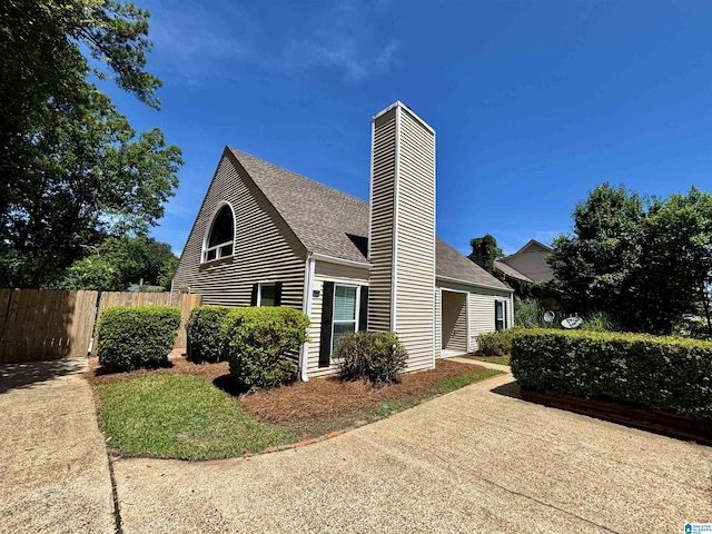 1221 Dalraida Rd, Montgomery, AL 36109 - view of property exterior with a chimney and roof with shingles