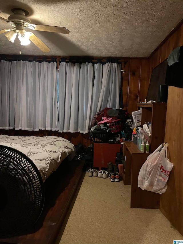 67 Evans Bridge Rd, Heflin, AL 36264 - bedroom featuring a textured ceiling, carpet, and ceiling fan