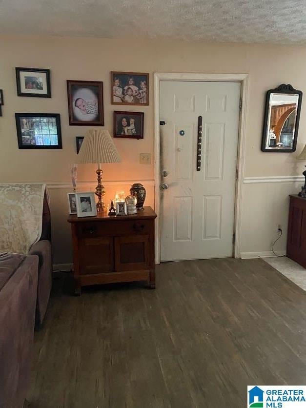 67 Evans Bridge Rd, Heflin, AL 36264 - foyer featuring wood finished floors and a textured ceiling