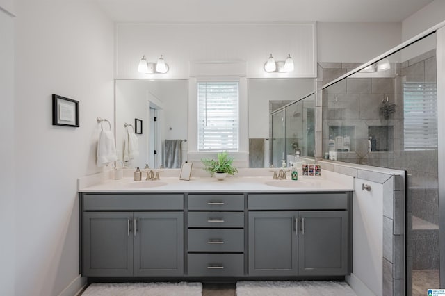 1268 Shades Ter, Irondale, AL 35210 - full bathroom with a shower stall and double vanity