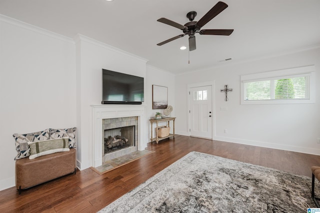 1268 Shades Ter, Irondale, AL 35210 - living area featuring ornamental molding, wood finished floors, a ceiling fan, a fireplace, and recessed lighting