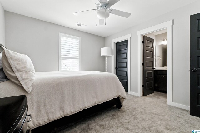 4855 Bo Run, Trussville, AL 35173 - bedroom with light colored carpet, connected bathroom, and ceiling fan