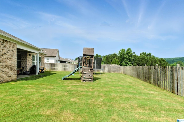 4855 Bo Run, Trussville, AL 35173 - fenced backyard featuring a playground