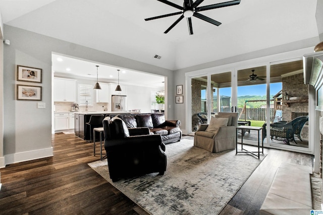 4855 Bo Run, Trussville, AL 35173 - living area with a ceiling fan, dark wood-style flooring, and a fireplace