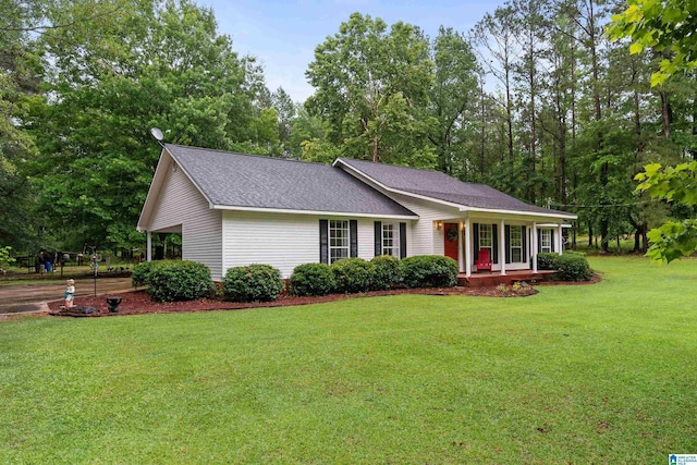 2690 Ingate Pass, Centreville, AL 35042 - ranch-style house with a porch, a front lawn, and a shingled roof