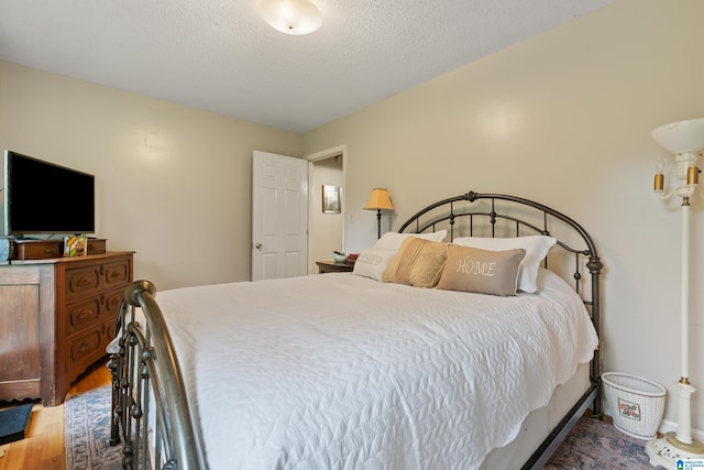 2690 Ingate Pass, Centreville, AL 35042 - bedroom featuring wood finished floors and baseboards