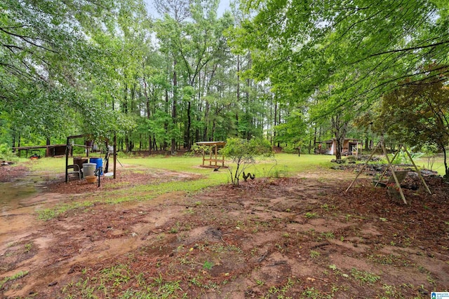 2690 Ingate Pass, Centreville, AL 35042 - view of yard featuring an outdoor structure and view of scattered trees