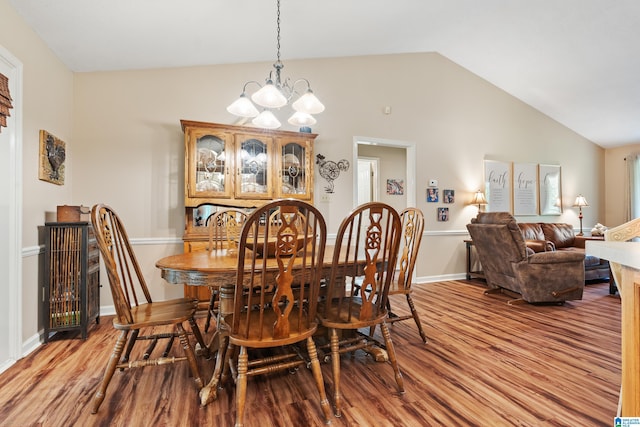 2690 Ingate Pass, Centreville, AL 35042 - dining space featuring light wood-style floors, vaulted ceiling, and a chandelier