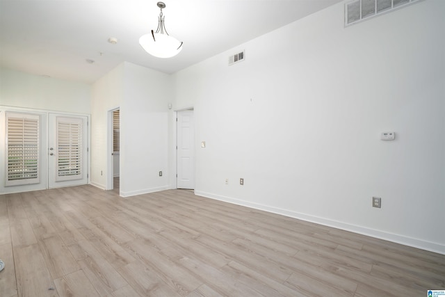 401 20th St S Unit 126, Birmingham, AL 35233 - empty room with light wood-style floors and baseboards