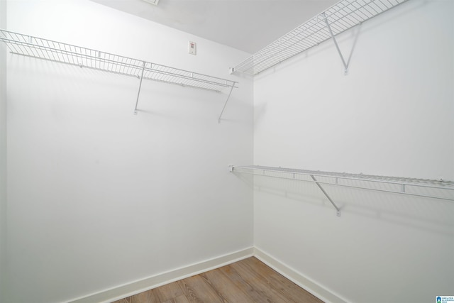 401 20th St S Unit 126, Birmingham, AL 35233 - spacious closet featuring wood finished floors