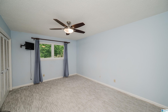 3655 Haven View Cir, Hoover, AL 35216 - unfurnished bedroom with a closet, a ceiling fan, and a textured ceiling