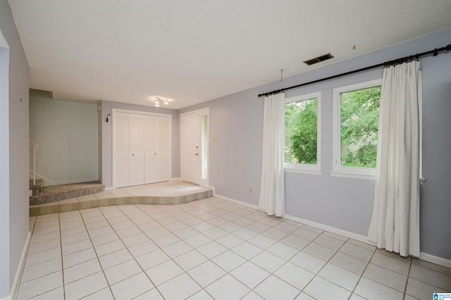3655 Haven View Cir, Hoover, AL 35216 - spare room with light tile patterned floors and baseboards