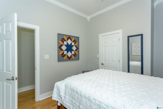 4650 Nicholas Dr, Bessemer, AL 35022 - bedroom with crown molding and light wood finished floors