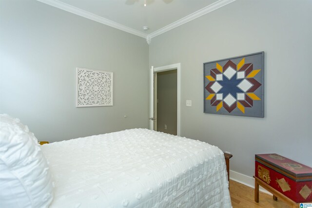 4650 Nicholas Dr, Bessemer, AL 35022 - bedroom with ornamental molding, wood finished floors, and a ceiling fan