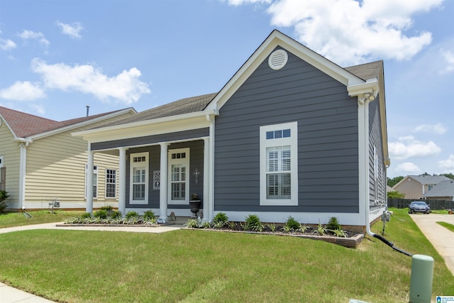 4650 Nicholas Dr, Bessemer, AL 35022 - view of front of property with a front yard and covered porch