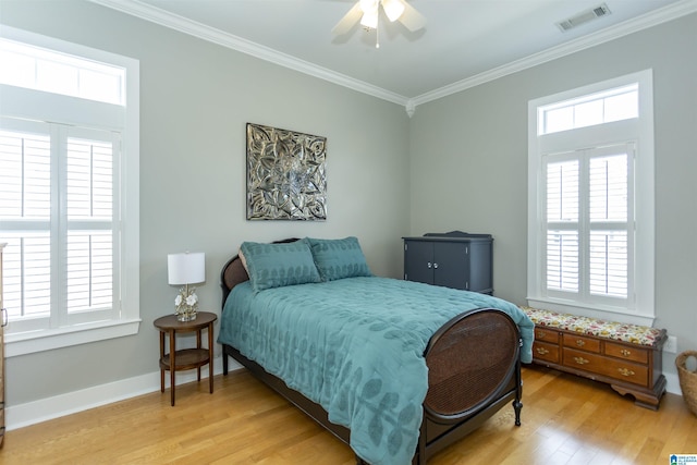 4650 Nicholas Dr, Bessemer, AL 35022 - bedroom with light wood-style flooring, ornamental molding, and ceiling fan