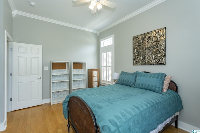 4650 Nicholas Dr, Bessemer, AL 35022 - bedroom with crown molding, light wood-style flooring, and ceiling fan