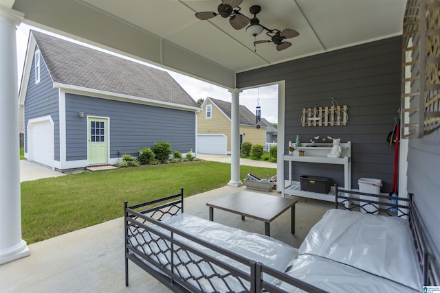4650 Nicholas Dr, Bessemer, AL 35022 - view of patio / terrace with a garage, a ceiling fan, and an outdoor hangout area