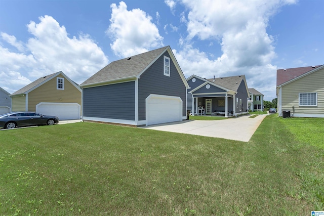 4650 Nicholas Dr, Bessemer, AL 35022 - traditional-style home featuring a front lawn and a detached garage