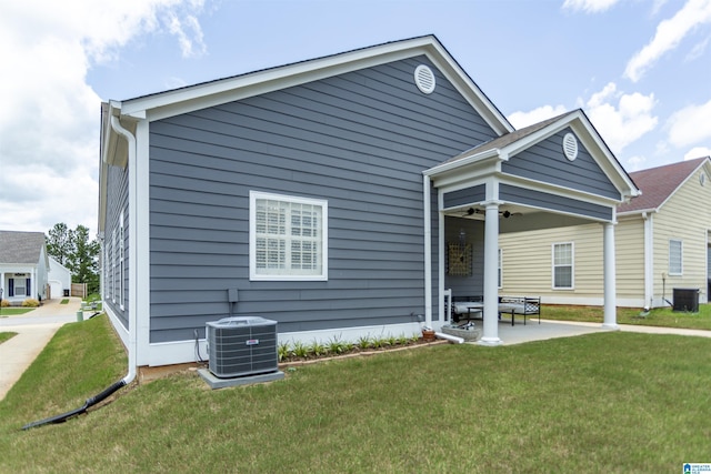 4650 Nicholas Dr, Bessemer, AL 35022 - view of front facade featuring a ceiling fan, a front yard, and a patio area