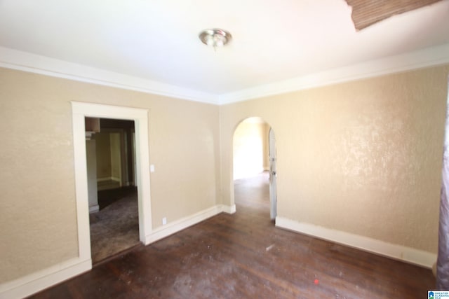 1420 47th St, Birmingham, AL 35208 - empty room with arched walkways, wood finished floors, and ornamental molding
