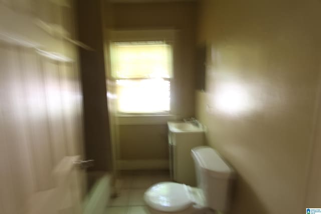 1420 47th St, Birmingham, AL 35208 - bathroom with vanity, tile patterned flooring, and shower / washtub combination