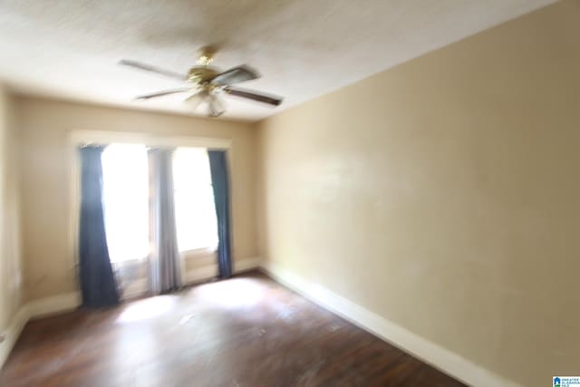 1420 47th St, Birmingham, AL 35208 - empty room featuring ceiling fan and dark wood finished floors