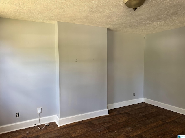 319 Lapsley Ave, Anniston, AL 36207 - empty room featuring a textured ceiling and wood finished floors