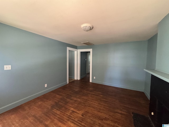 319 Lapsley Ave, Anniston, AL 36207 - spare room with wood finished floors and baseboards
