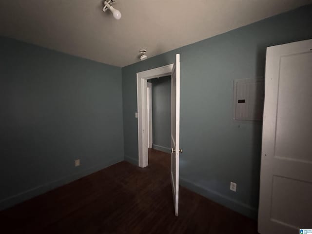 319 Lapsley Ave, Anniston, AL 36207 - unfurnished bedroom featuring dark wood finished floors and electric panel