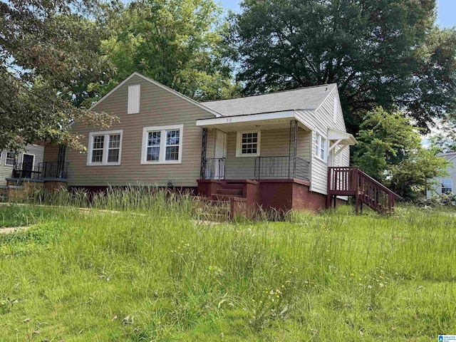319 Lapsley Ave, Anniston, AL 36207 - bungalow with a porch