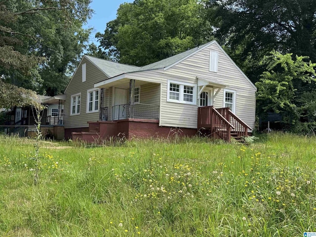 319 Lapsley Ave, Anniston, AL 36207 - view of front of home with roof with shingles