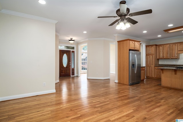 1819 Calgary Dr, Birmingham, AL 35022 - kitchen featuring stainless steel refrigerator with ice dispenser, crown molding, light wood-style floors, open floor plan, and recessed lighting