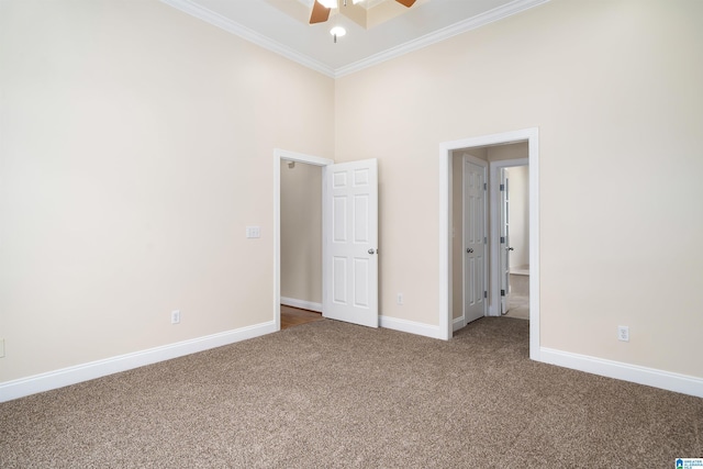 1819 Calgary Dr, Birmingham, AL 35022 - unfurnished bedroom with ornamental molding, carpet, a ceiling fan, and a towering ceiling