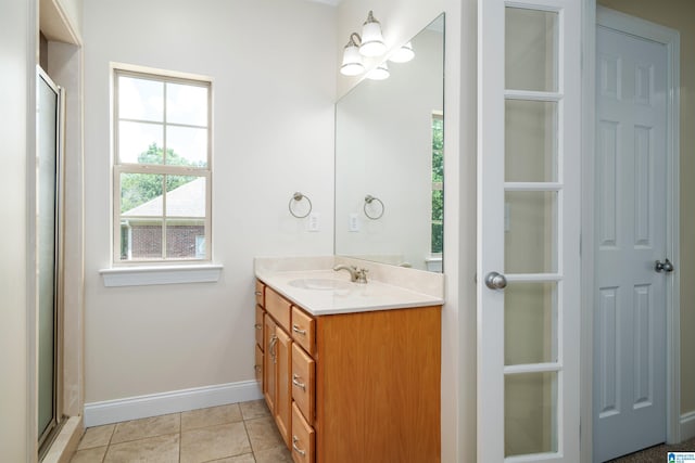 1819 Calgary Dr, Birmingham, AL 35022 - full bath featuring vanity, a shower with door, and tile patterned floors